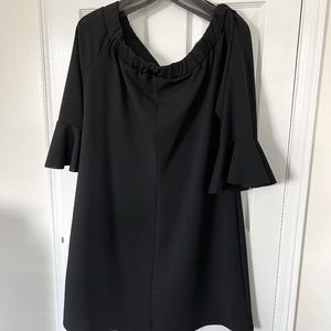 Black, knee length dress for all occasion. A  dress that never goes out of style
